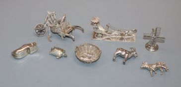 A group of Dutch and other silver/white metal miniature novelties, including a goat pin cushion (
