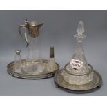 A cut glass bowl with a silver rim, a plated mounted glass claret jug, a glass decanter and sundry