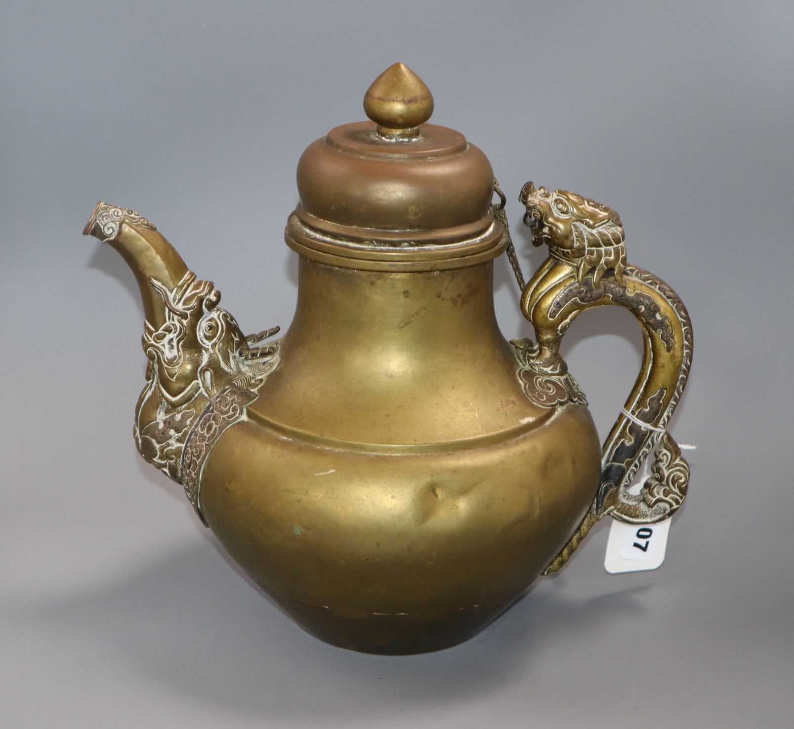 A 19th century Tibetan brass and silver overlaid teapot zoomorphic spout and dragon handle, H. - Image 2 of 2