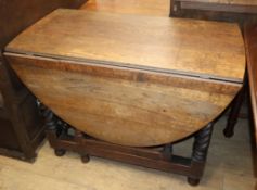 A late 19th century oak oval gateleg table W.104cm