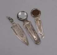 A Sampson Mordan silver 'man-in-the-moon' combination bookmark and magnifying glass and two other