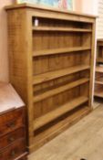 A large modern oak open bookcase W.183cm