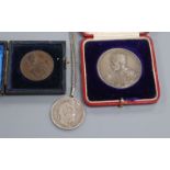 Admiral Lord Nelson of the Nile commemorative medal, a George V coronation medal and a coin pendant