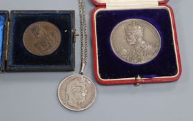 Admiral Lord Nelson of the Nile commemorative medal, a George V coronation medal and a coin pendant