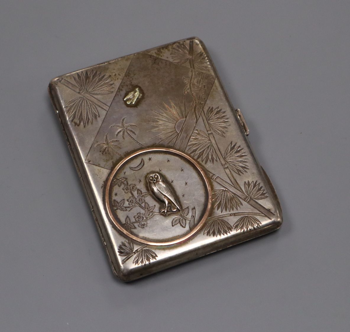 A late Victorian silver cigarette case with aesthetic decoration, Deakin & Francis, Birmingham,