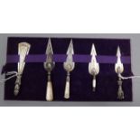 Five Victorian and later silver or white metal bookmarks, including four 'trowel' and one fan-shaped