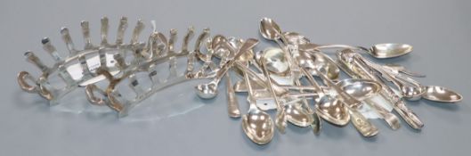 A pair of Adie Bros stylish silver toast racks and a collection of Georgian and later silver spoons,