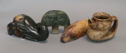 Four Chinese archaistic jade or hardstone zoomorphic carvings, including a pig, elephant head, a