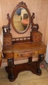 A late Victorian mahogany 'Duchess' dressing table