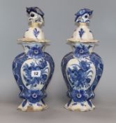 A pair of late 18th century Dutch delft lidded vases and covers (a.f.) height 35cm