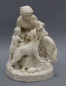 A Victorian parian group modelled as a seated lady with two hunting dogs, a child at her side, on