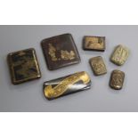 Three gold damascened iron cases and four Japanese vesta cases