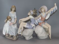 A Lladro figure, 'Sunning in Ipanema', No. 5660 and two other figures, 'Bathing Beauty', No. 5615