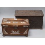 A Victorian carved wood tea caddy and a mother of pearl inset rosewood tea caddy longest 37cm