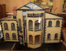 A large painted doll's house W.118cm