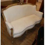 A 19th century French upholstered settee Length 180cm