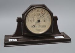 A bakelite table barometer by Short & Mason