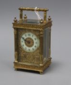 A late 19th century French brass cased carriage timepiece 15cm incl. handle