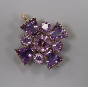 A late Victorian yellow metal and amethyst set cross pendant brooch, 38mm.