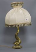 A cast brass dolphin Hermes lamp base