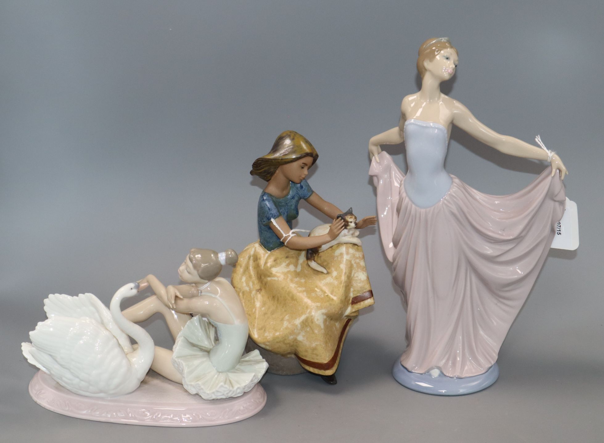 Three Lladro figures, 'Grace and Beauty', No. 6204, 'Dancer', No. 5050 and 'Repose', No. 2169 (3,