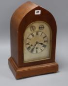 A mahogany lancet shaped mantel clock height 41cm