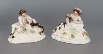 A pair of Staffordshire porcelain groups of a shepherd and his dog and a goatherdess and a goat, c.