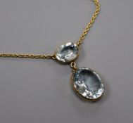 An early 20th century 9ct yellow metal and aquamarine set drop pendant necklace, pendant 31mm.