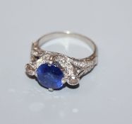 A white metal synthetic? sapphire and diamond set dress ring, the shank stamped 'PALL'?, size K.