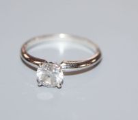 A 14k white metal and solitaire diamond ring, stone diameter approximately 5.7mm, size K/L.