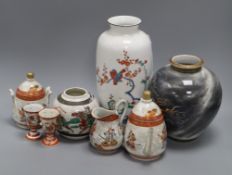 A group of Japanese ceramics, including a grey-ground dragon vase by Fukugawa, a white ground vase
