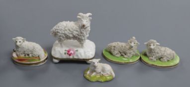 Five Staffordshire porcelain figures of sheep, c.1830-50, each base painted with enamel colours,