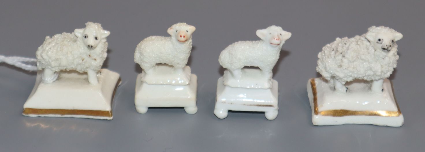 Four Staffordshire porcelain toy figures of sheep, c.1830-50, possibly Dudson, H. approx 3.