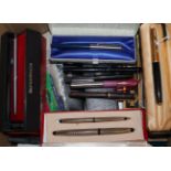 A collection of fountain and ballpoint pens, some boxed, including Parker 51 and 61, Parker