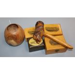 A turned wood pot, a carved wood 'Gladstone' pipe and four Mauchline ware boxes, comprising '