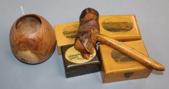 A turned wood pot, a carved wood 'Gladstone' pipe and four Mauchline ware boxes, comprising '