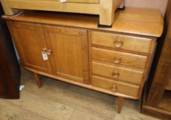 A 1970's Meredew style oak sideboard Width 120cm