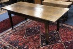 A late 18th/early 19th century oak plank top kitchen table length 198cm