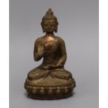 A Chinese gilt bronze figure of Buddha height 20.5cm