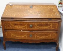 An 18th century continental marquetry inlaid walnut serpentine front bureau W.124cm