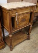 An early 20th century French marble top walnut small cabinet