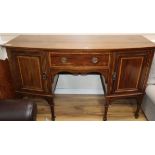 An Edwardian Sheraton revival mahogany bowfront sideboard W.153cm