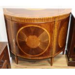 An Edwardian inlaid bowfront cabinet W.125cm