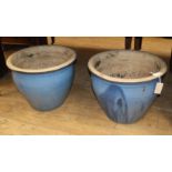 A pair of blue glazed garden planters H.37cm