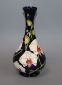 A Moorcroft Chatsworth Orchid bottle vase, seconds limited edition 377/350 height 23cm