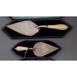 Two cased ivory handled silver trowels including Victorian, Sheffield, 1886, largest 37.5cm.