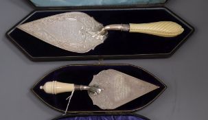 Two cased ivory handled silver trowels including Victorian, Sheffield, 1886, largest 37.5cm.