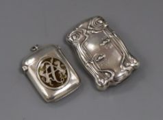 A late Victorian silver and enamel vesta case and an American Art Nouveau sterling vesta case,