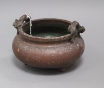 A Chinese bronze tripod censer