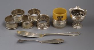 Seven assorted napkin rings including five silver and one French white metal, a small white metal